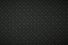 Multi coloured dots on brown