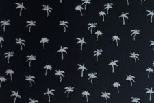 White palm trees on midnight blue